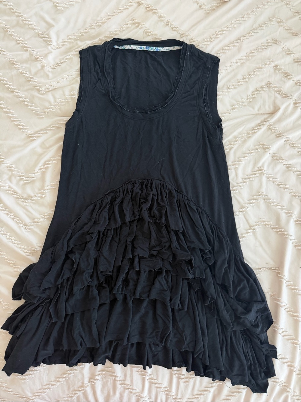Black Ruffle Hem Sleeveless Top